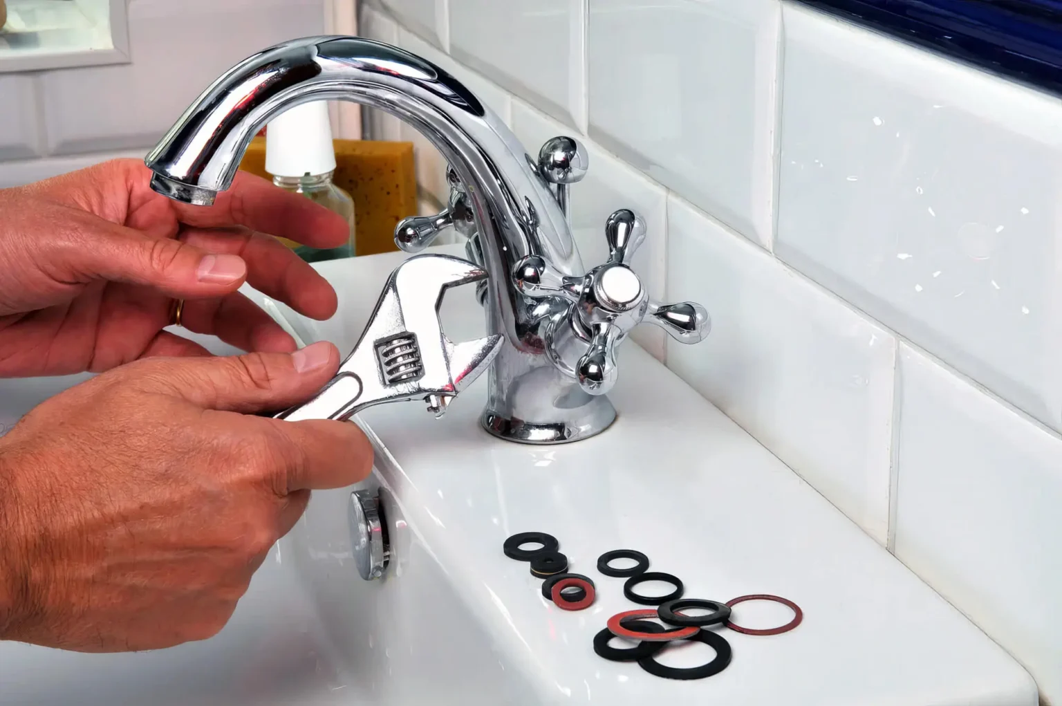 Plumber maintaining a bathroom faucet in San Gabriel